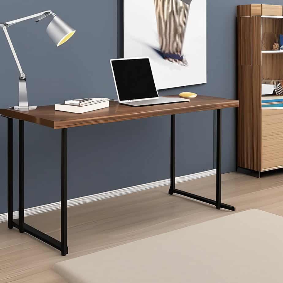 Wood home office desk with a laptop and adjustable task lamp.